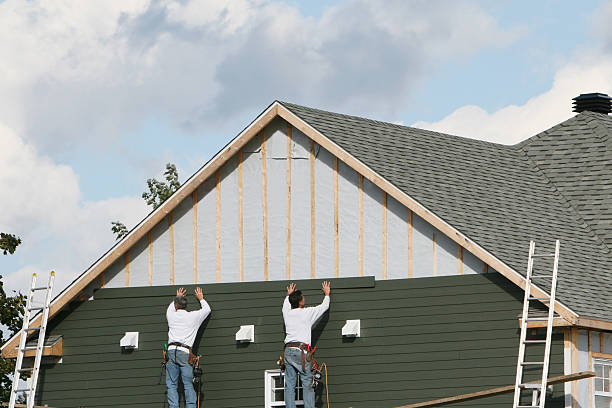 Professional Siding technician working in North Canton, CT